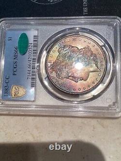 1883 CC $1 Morgan Silver Dollar MS 66 and CAC PCGS, Rattler Rainbow Toned GEM