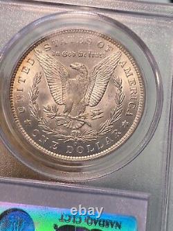 1885-O $1 PCGS/CAC MS65 Morgan Rainbow Crescent Toned GEM CAC Holder Chipped