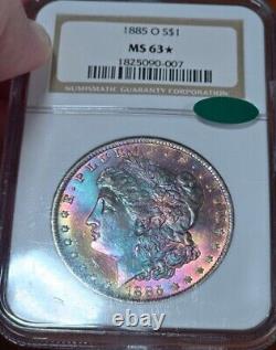 1885 O Morgan Silver Dollar NGC MS63 Star CAC Monster Rainbow Toned GEM