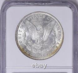 1885 O Morgan Silver Dollar NGC MS63 Star CAC Monster Rainbow Toned GEM