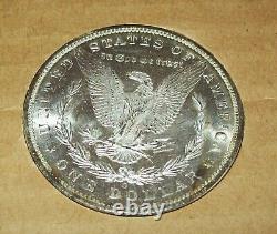 1885-O Morgan Silver Dollar in Tidy House Card Choice/GEM BU? Nice