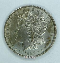 1887 P Morgan Silver Dollar GEM BU Toned