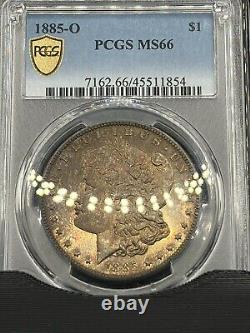 #690 1885 O Morgan Silver Dollar PCGS MS66. Flawless Monster Toned Gem